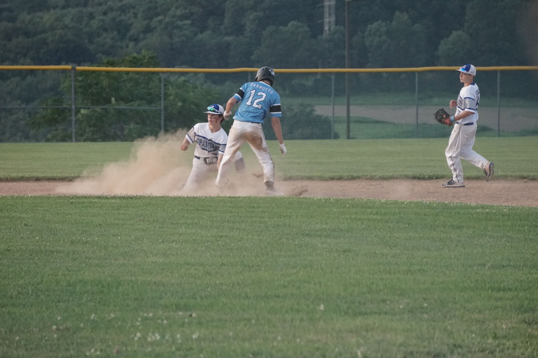 Pitcher winding up on a regulation 60-foot mound