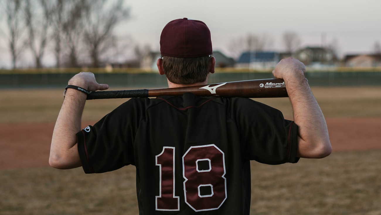 Bat barrel meeting the baseball at contact
