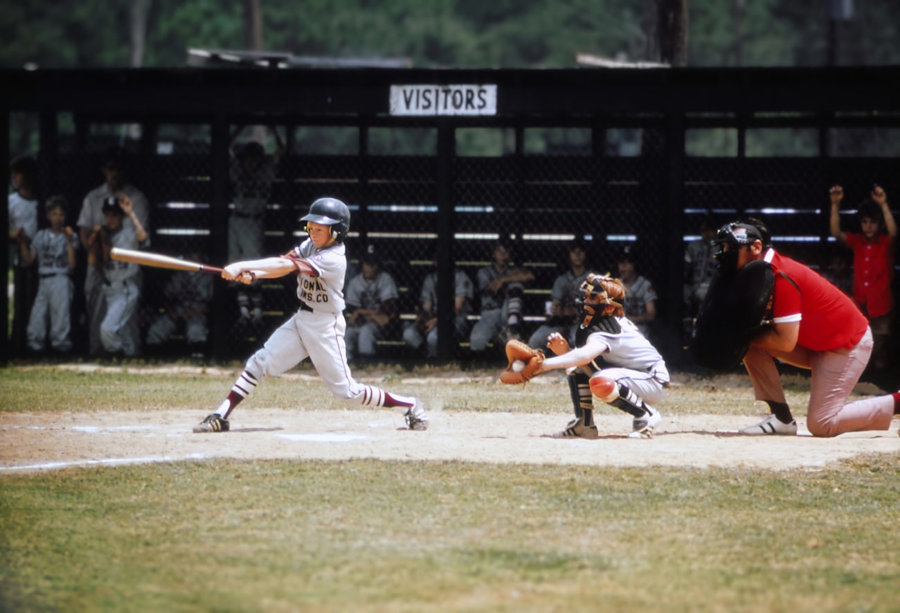 Hitter finishing a swing with full extension
