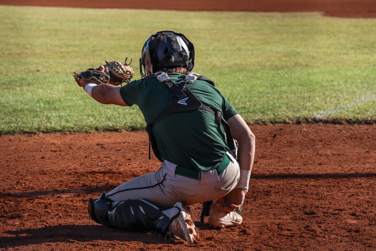Catcher framing a pitch at the plate