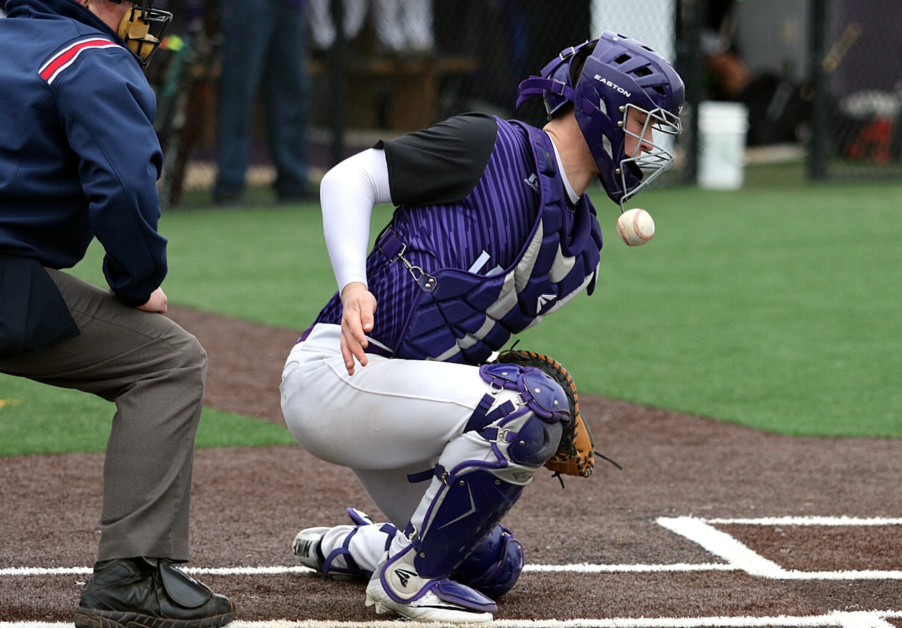 Catcher throwing down to second base