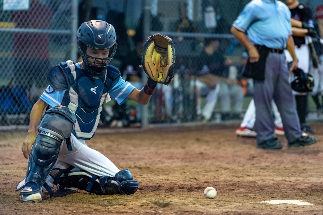 Young catcher working through practice drills