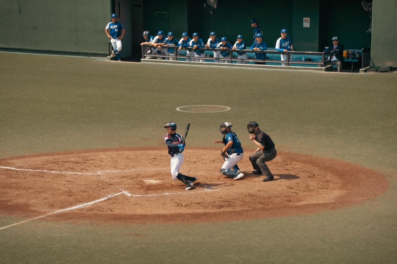 Families at a youth baseball field