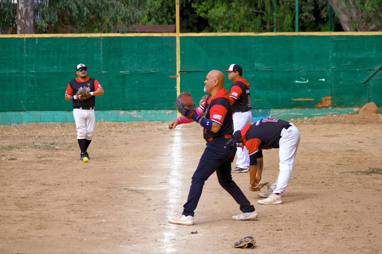Infielder fielding a ground ball