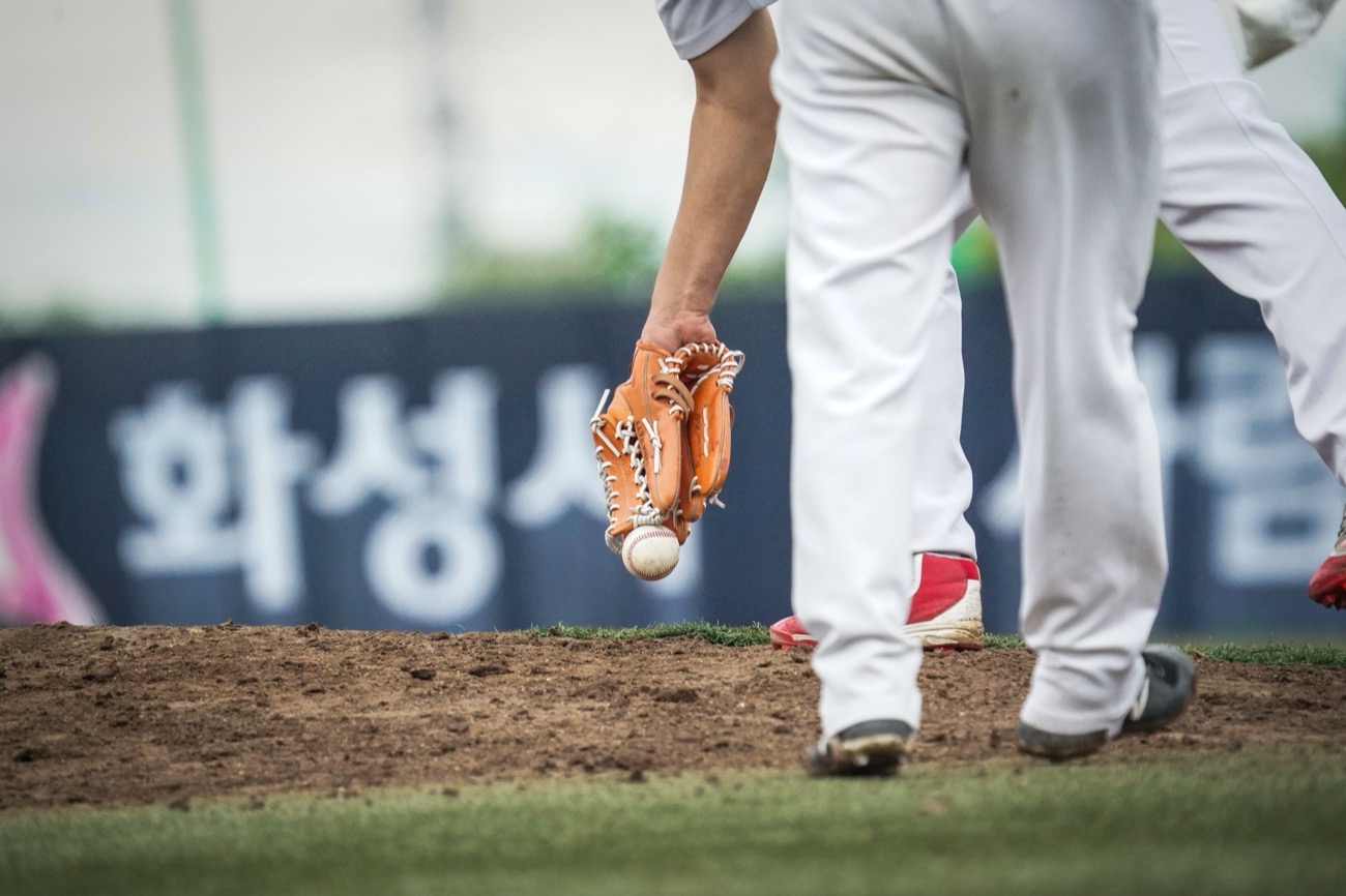 Middle infielder turning a double play