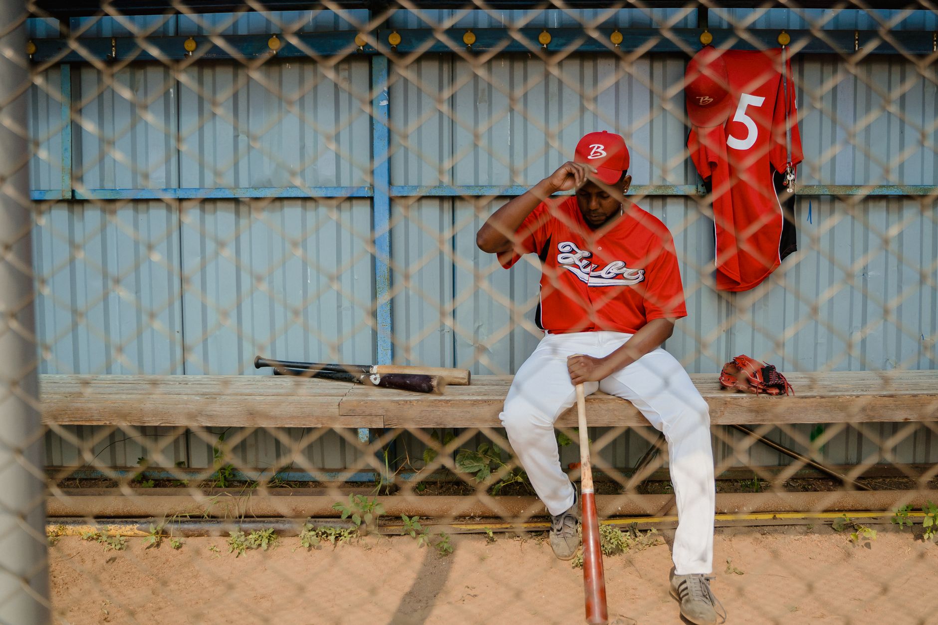 Batter waiting on deck and focusing
