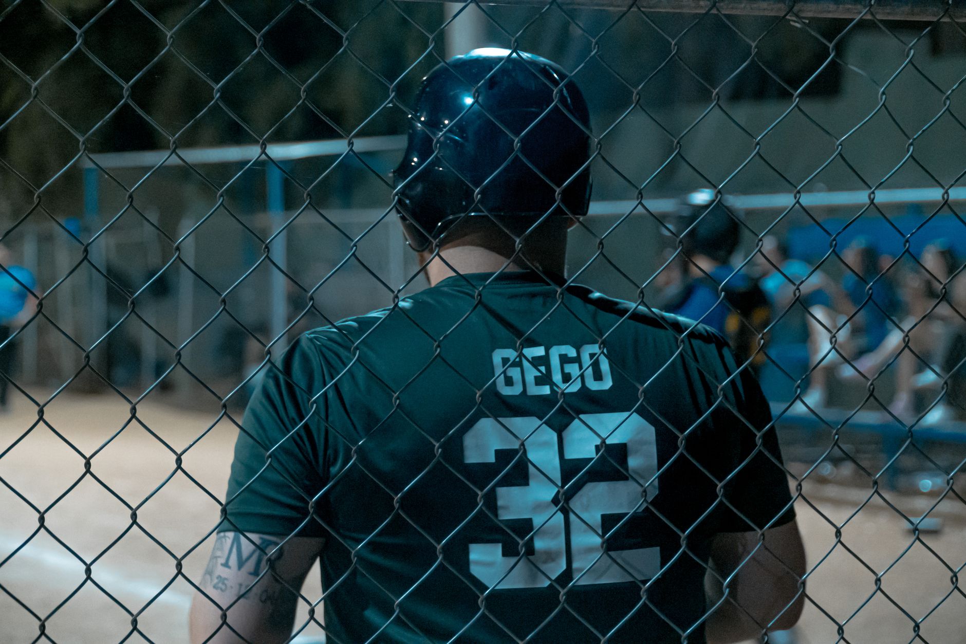 Coach encouraging a young baseball player