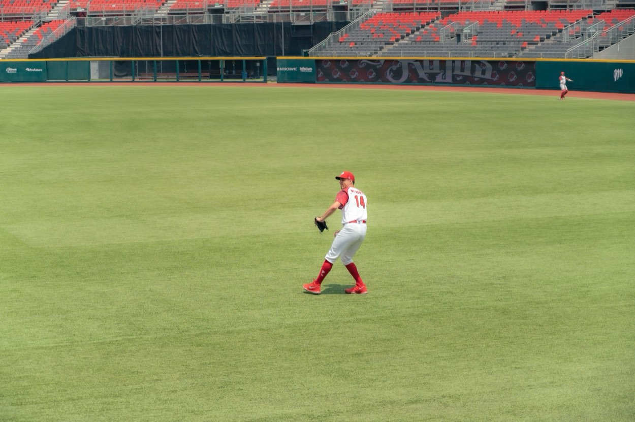 Outfielder tracking and catching a fly ball