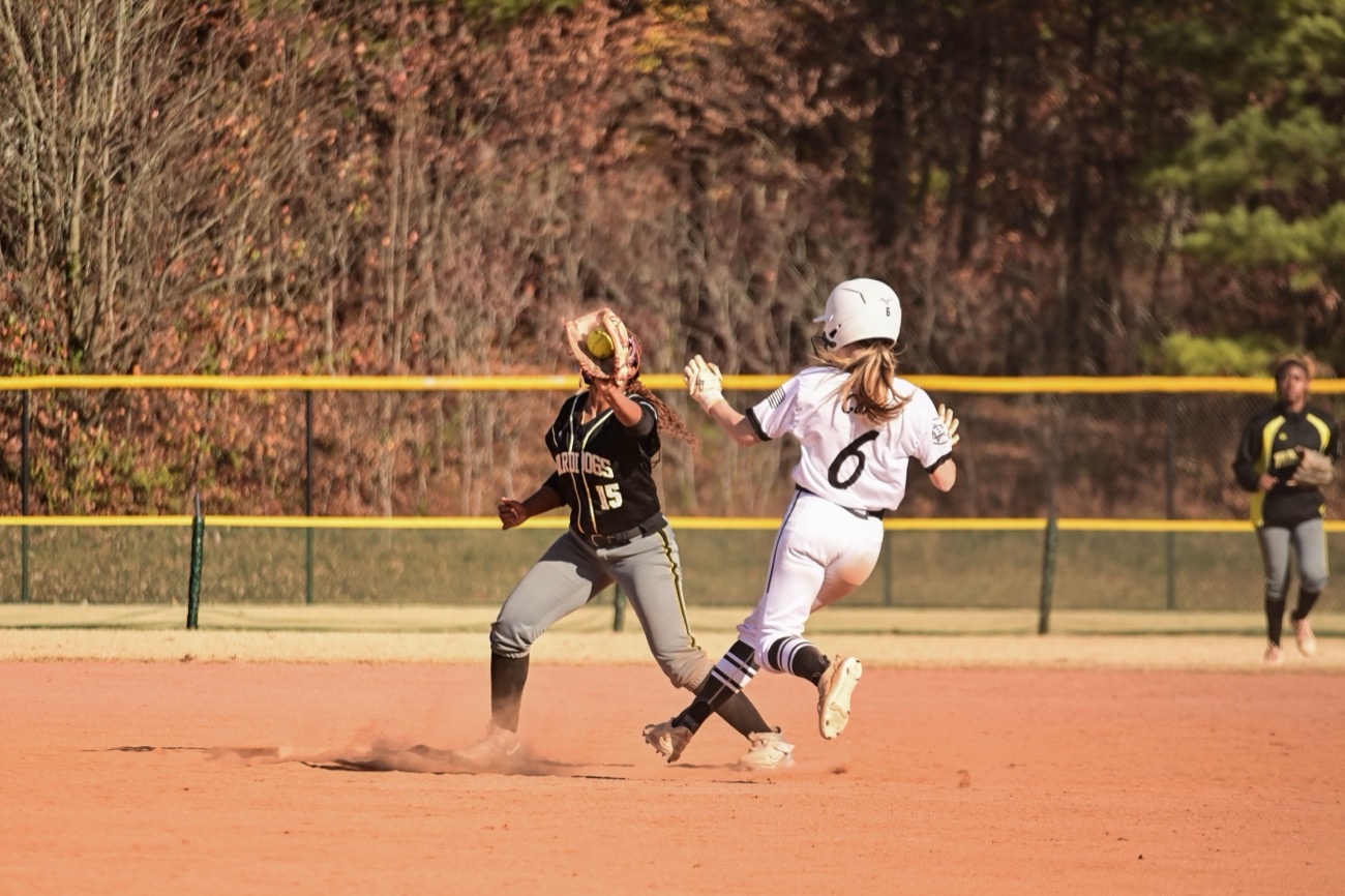 Outfielder running across the grass