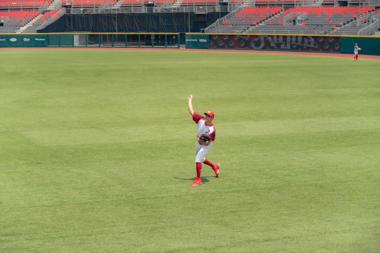 Outfielder throwing in from deep