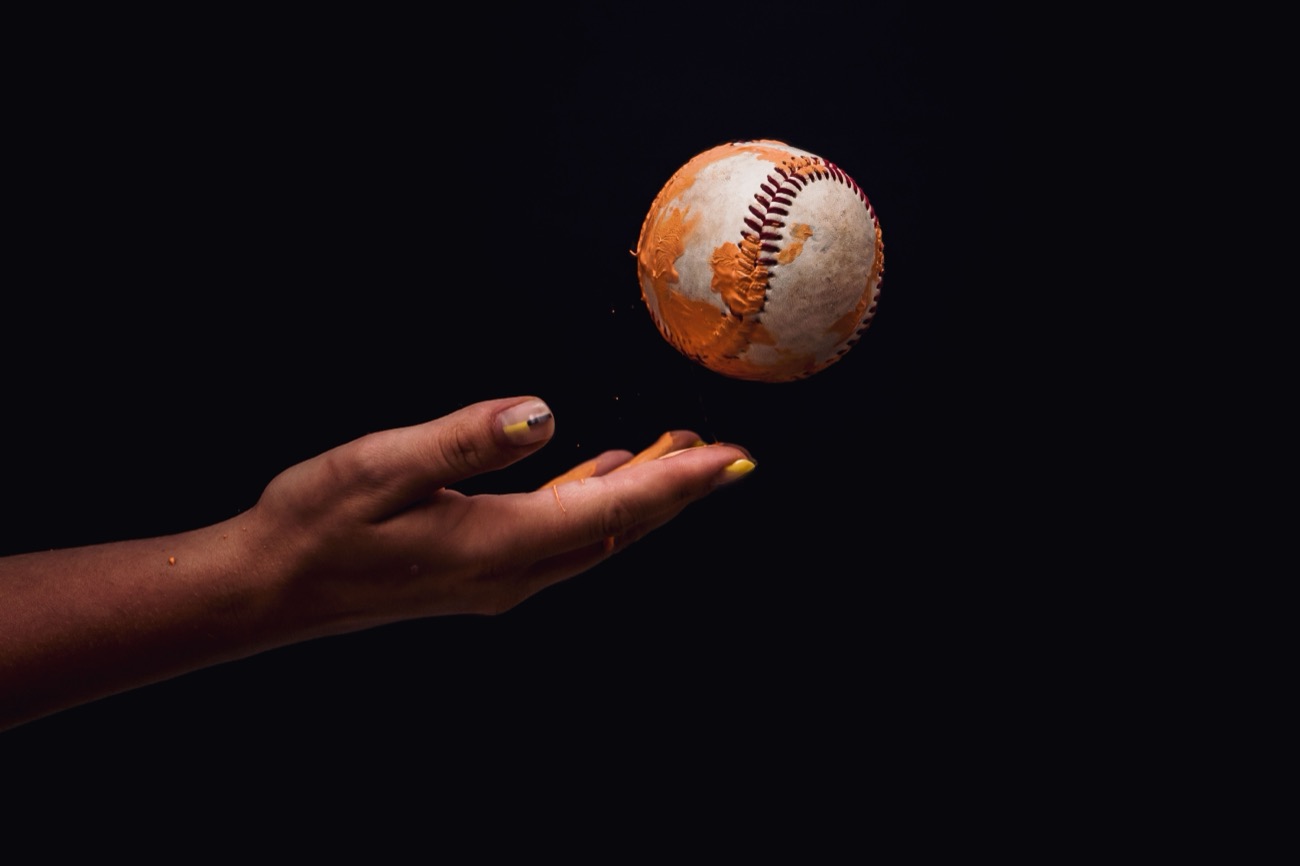 Pitcher concealing the grip in the glove