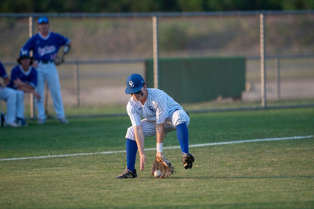Shortstop fielding a ground ball up the middle