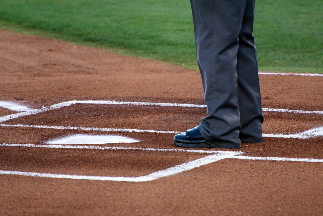 Umpire signalling safe at a base