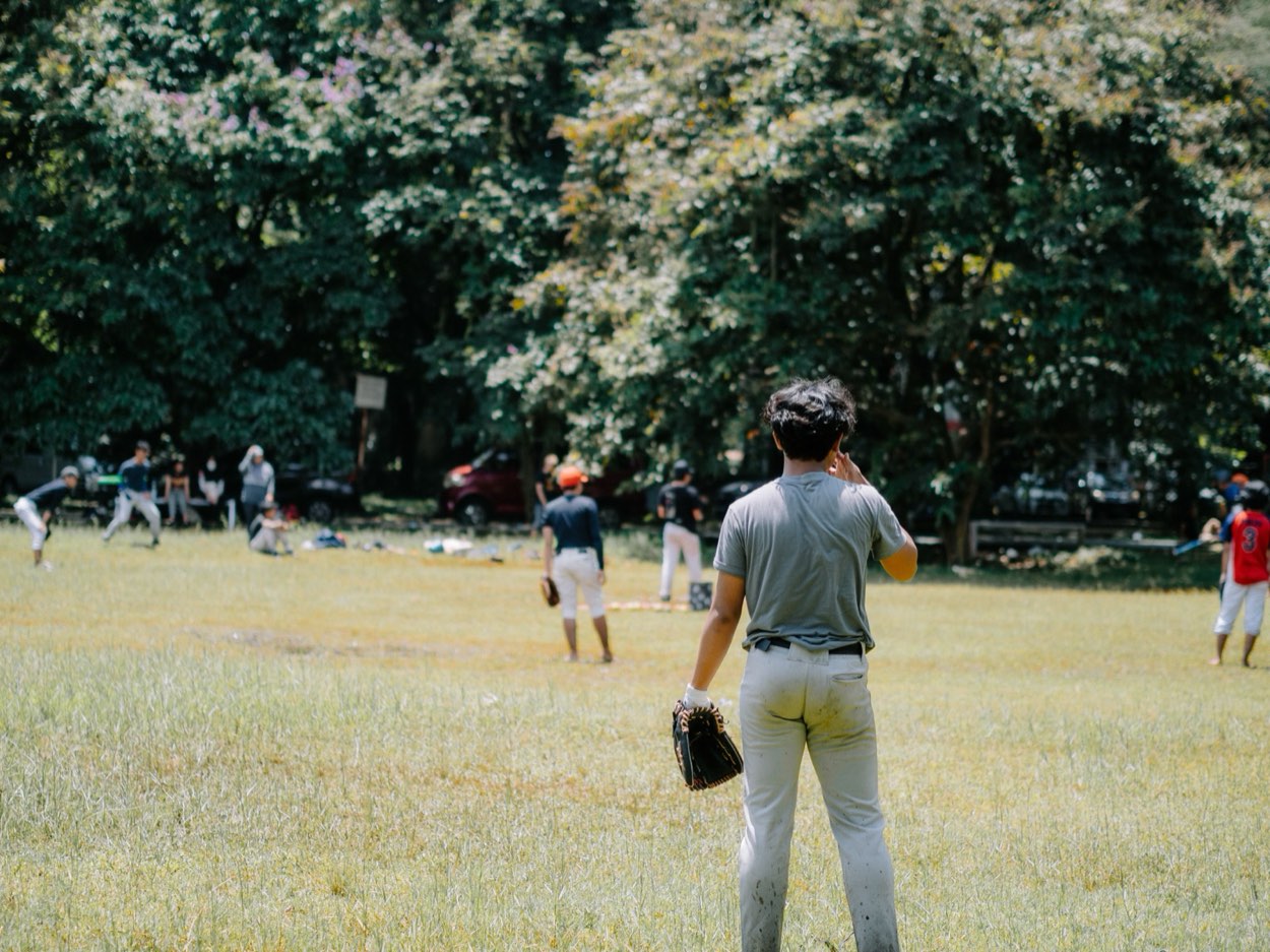 Player practising alone in a backyard