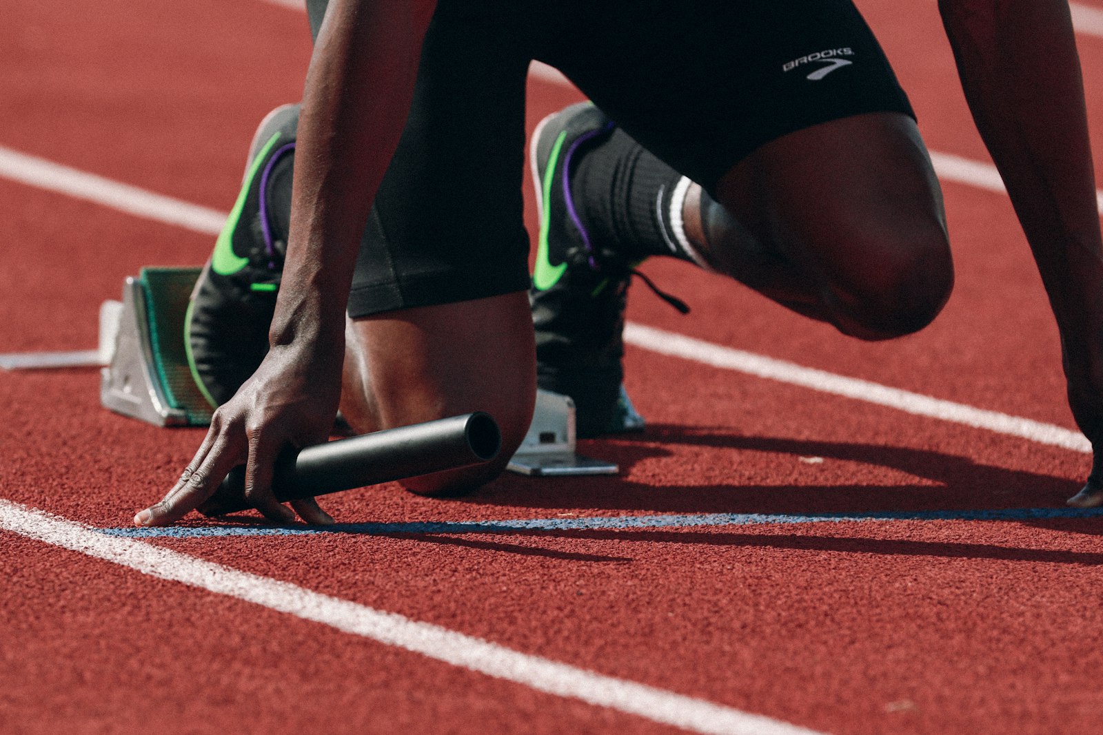 Athlete exploding out of a sprint start