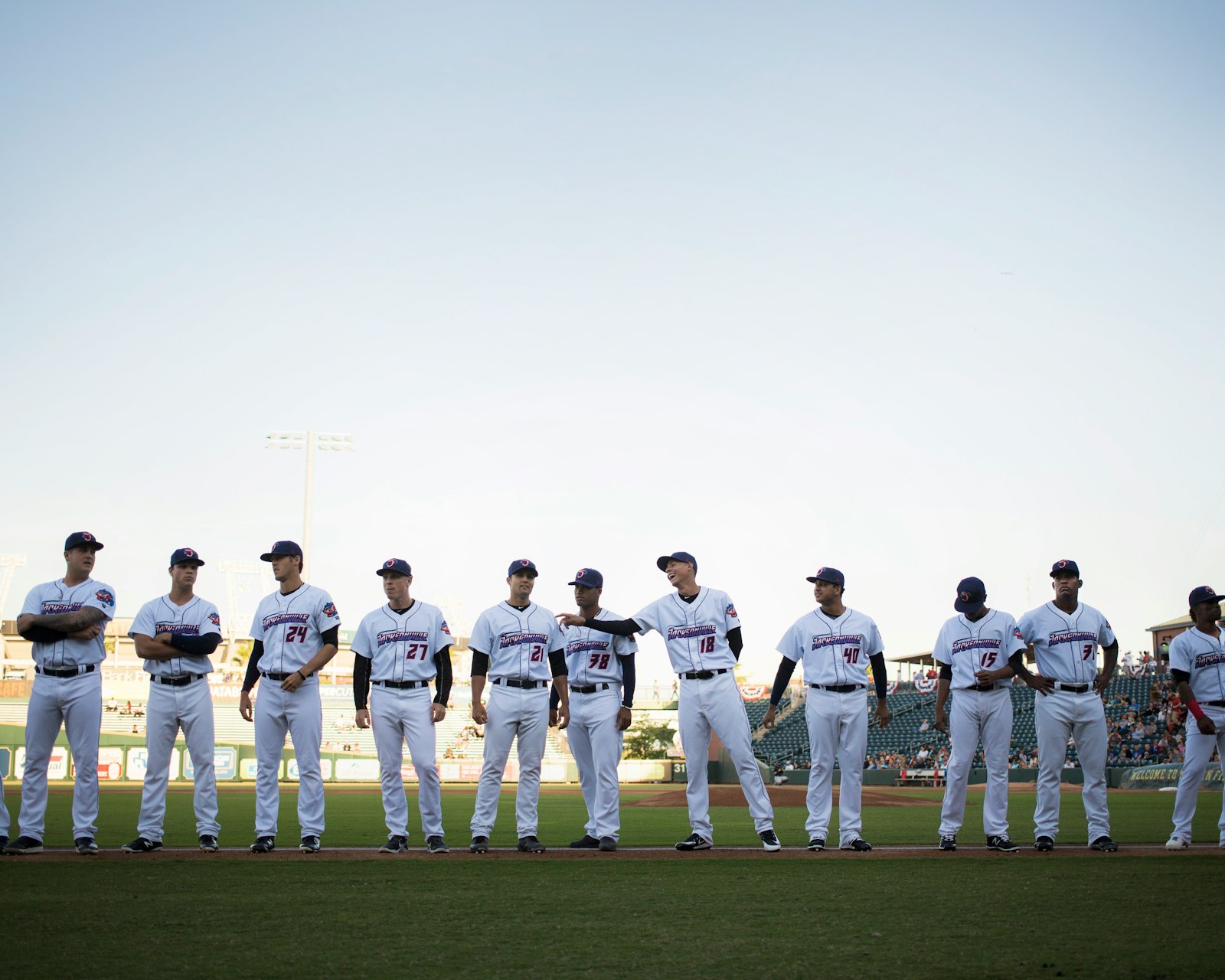 Baseball team celebrating together