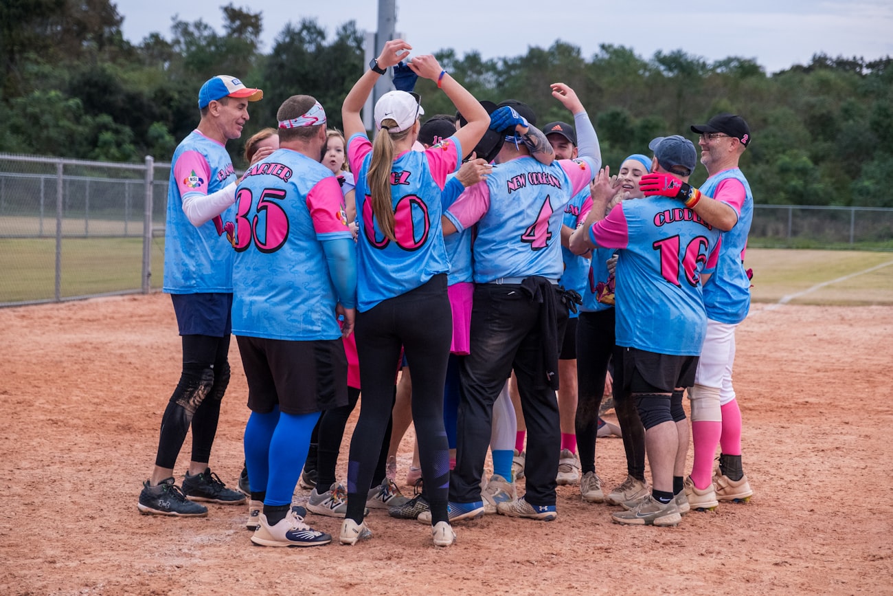 Players sharing a high five after a play
