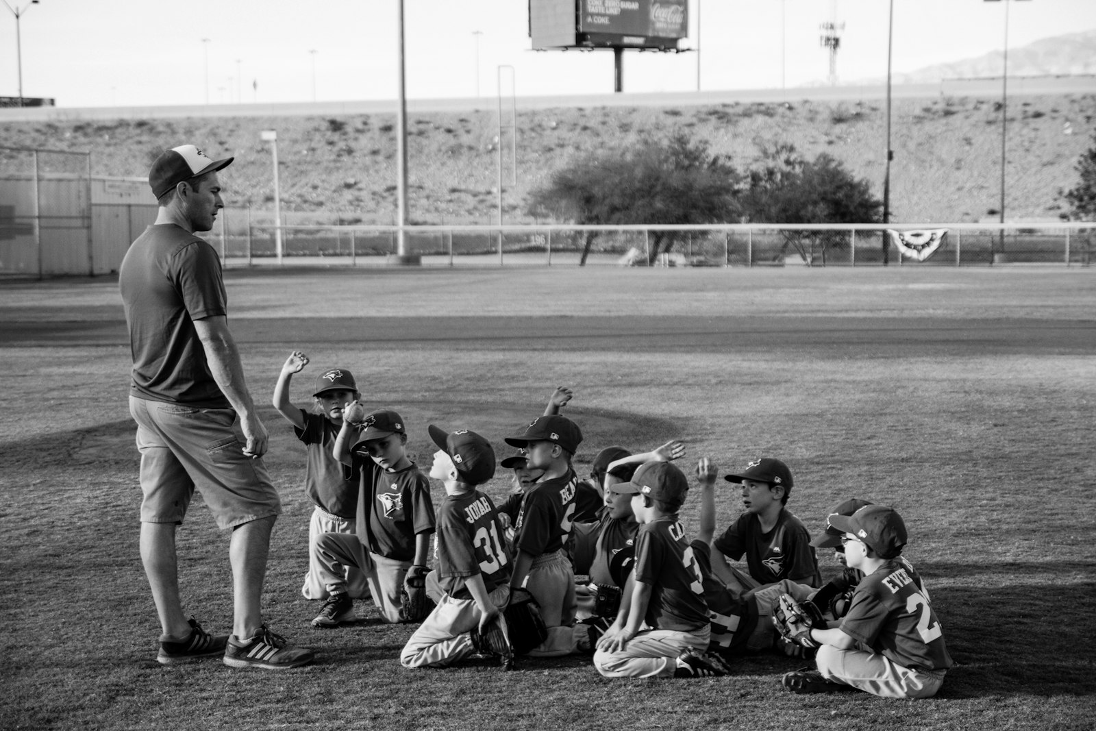 Coach working with a young player