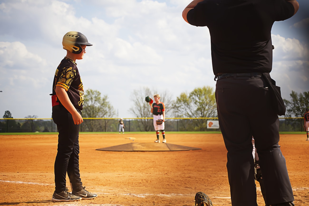 Parent and child at baseball practice