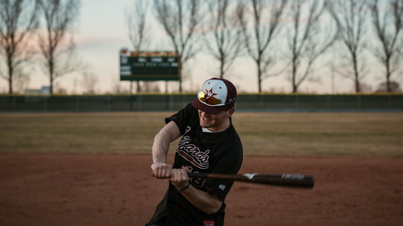 Girl competing in baseball