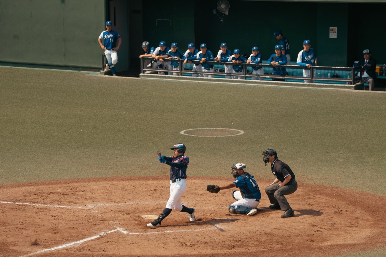 Players waiting for their turn to bat