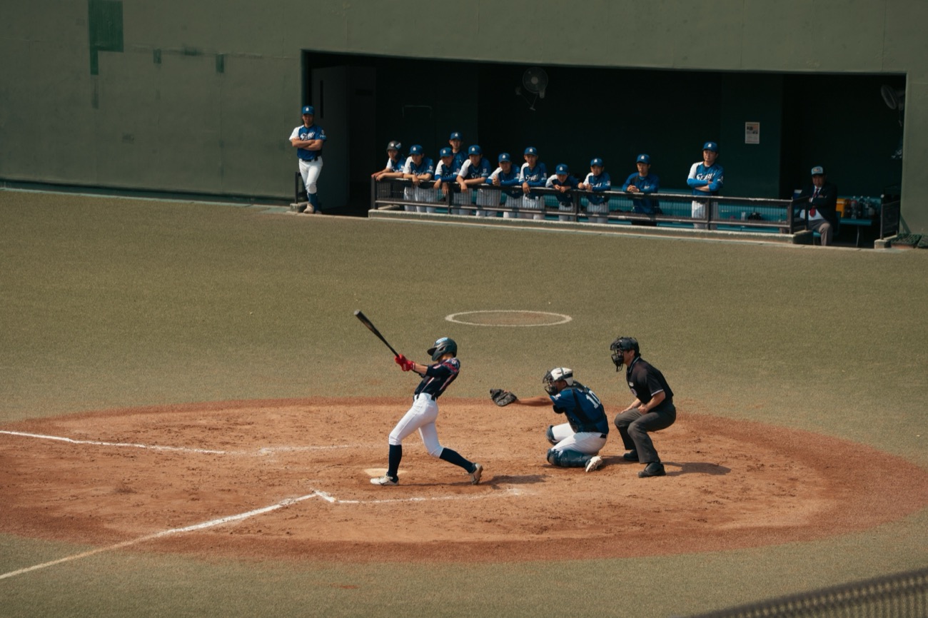 Team in the dugout during a game