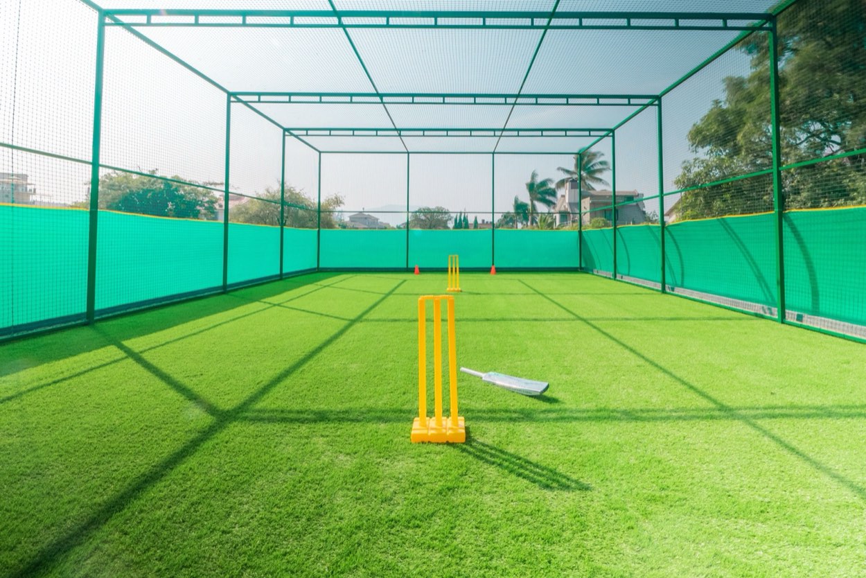 Indoor batting cage facility