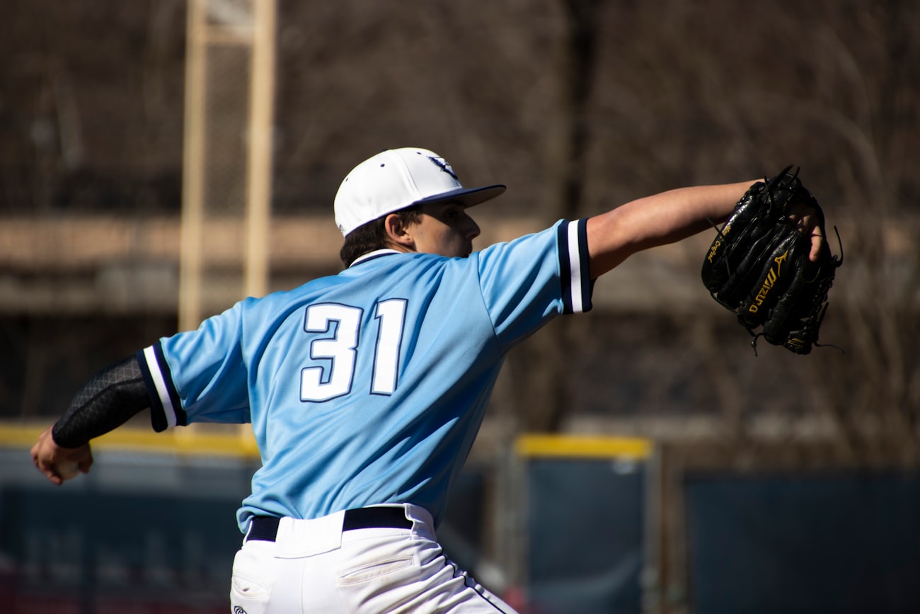 Left-handed hitter swinging