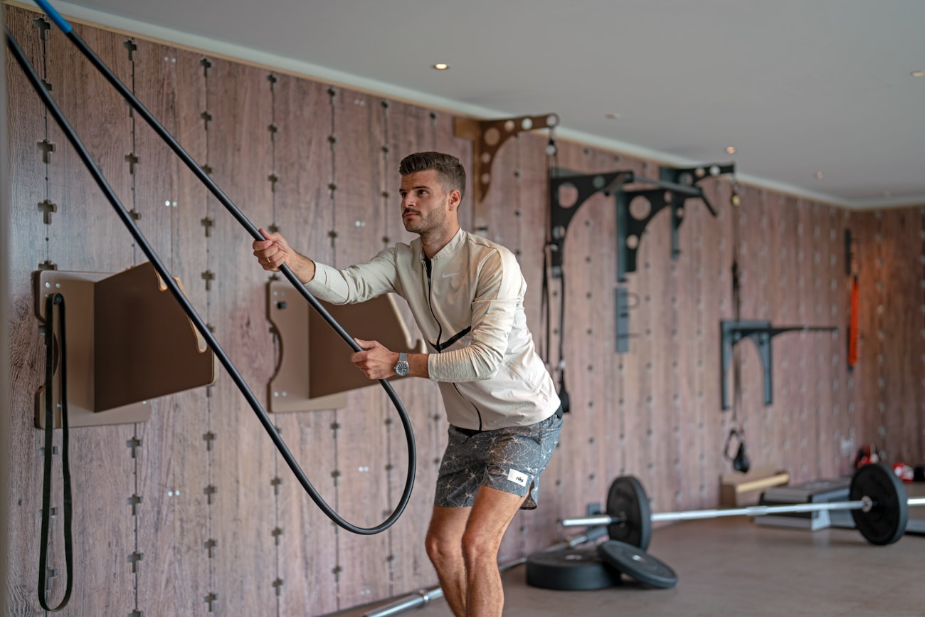 Athlete performing strength work with free weights