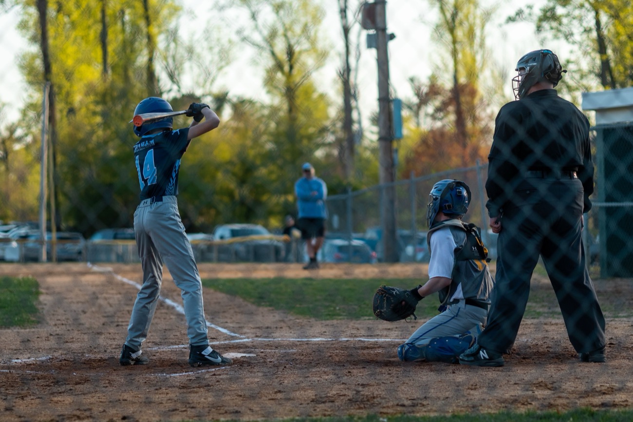Baseball team of mixed ages together