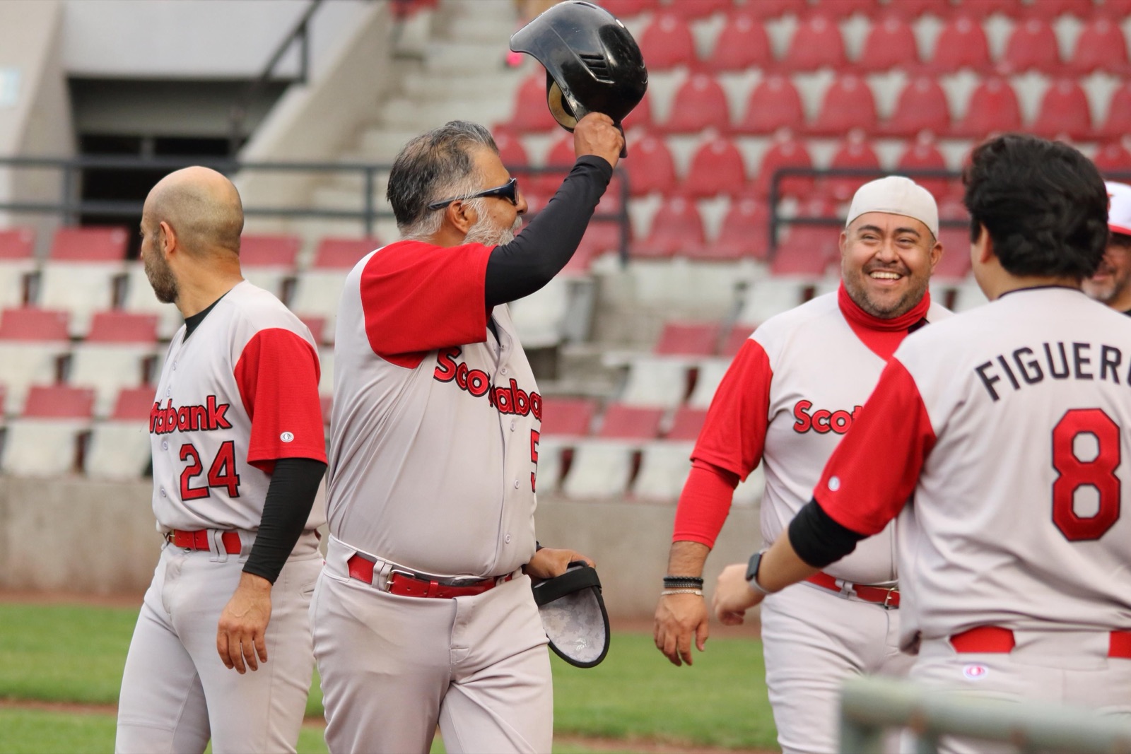 Younger player alongside older teammates