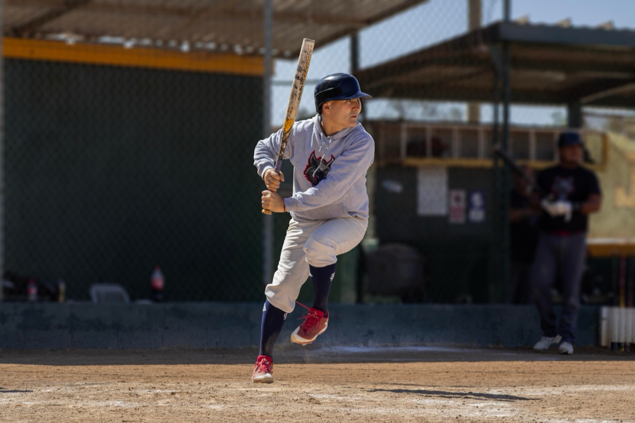 Teenager practising catch outdoors