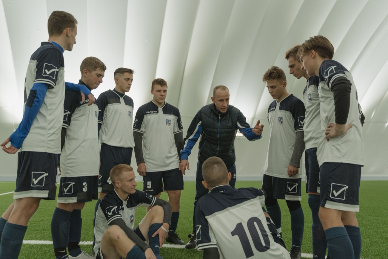 Coach discussing with a player