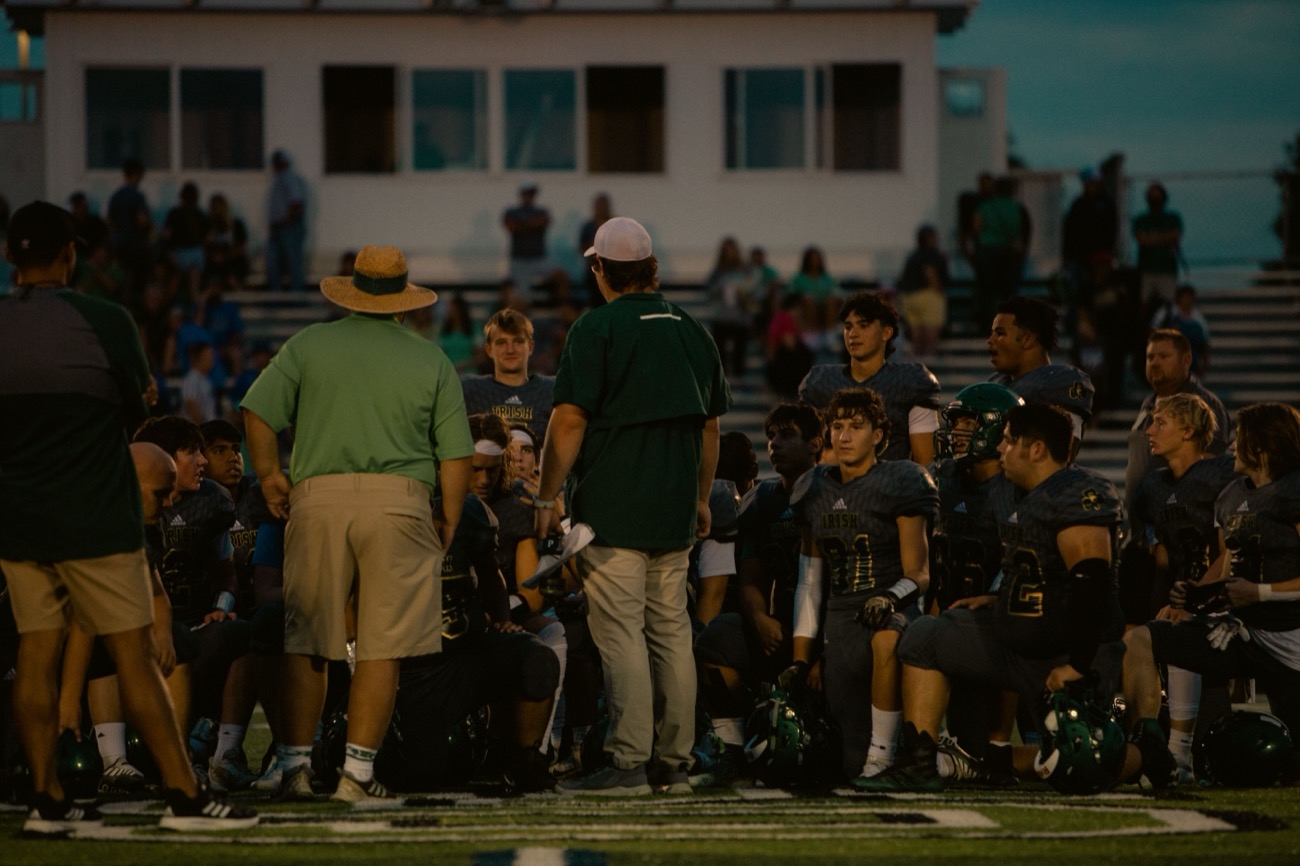 Player asking a coach a question