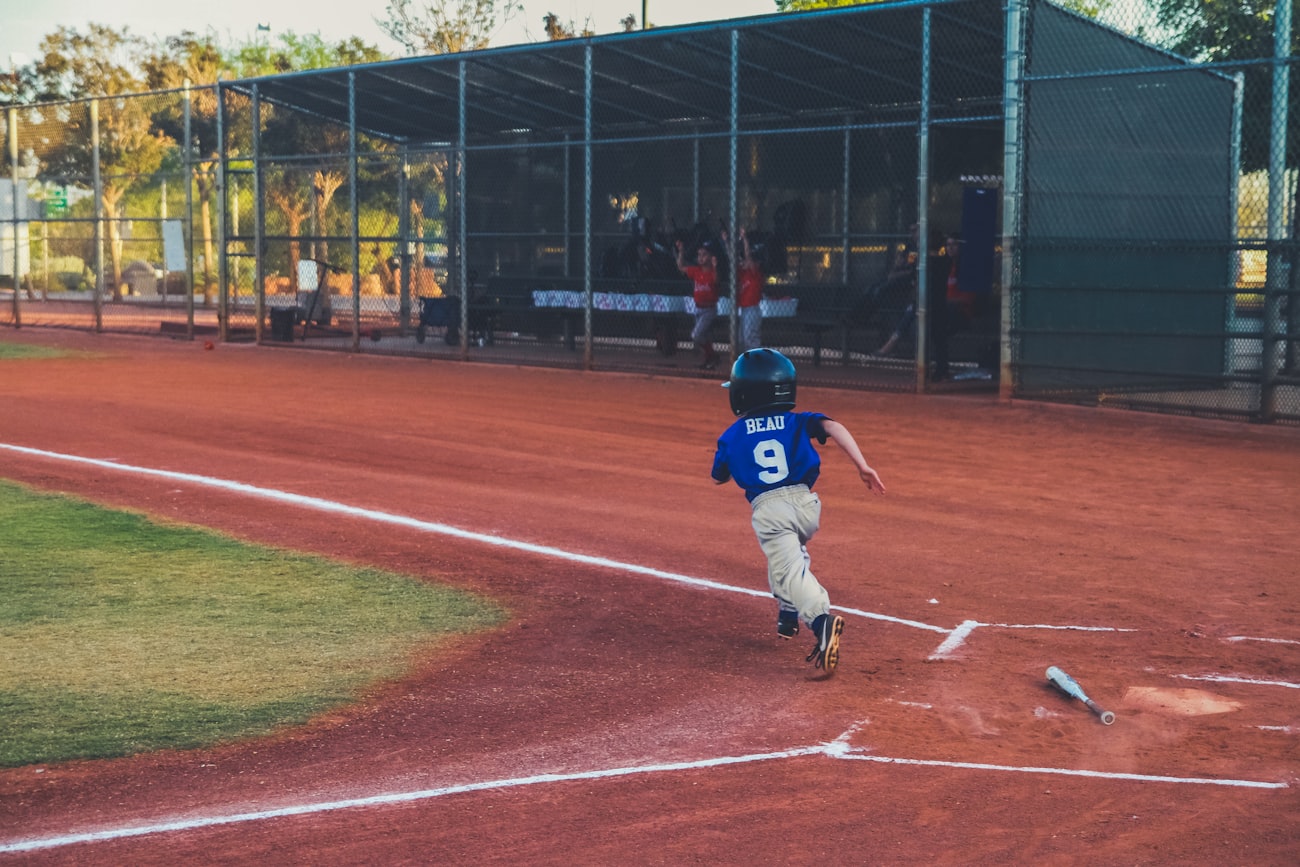 Outfielder throwing during a baseball tryout